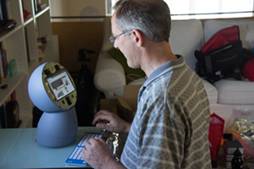 img of Jibo in use